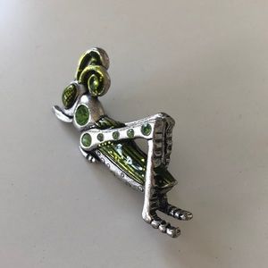 Whimsical grasshopper brooch